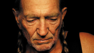 Man braid looking down hand - annie leibovitz free wallpaper