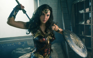 Woman costume sword shield brick - annie leibovitz free wallpaper