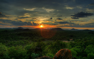 Sunset forest mountain clouds sky - a mountain in the background free wallpaper