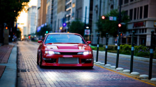 Red car street fence tilt - rim free wallpaper