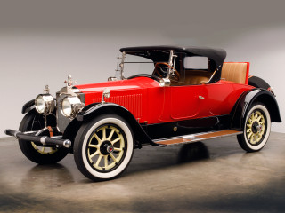 Red car black top brown - a white wall behind free wallpaper