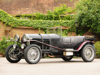 Old model car brick building - ivy free wallpaper