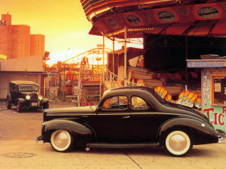 Black car carnival ride sunset - annie leibovitz free wallpaper