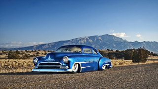 Blue car parked road mountain - a blue car free wallpaper