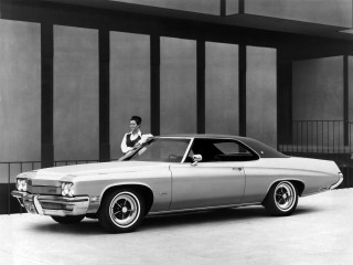 Man standing car parking lot 3 - a car in a parking lot free wallpaper