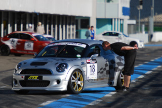 Man leaning car race track - a race track free wallpaper