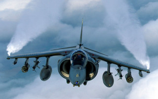 Jet flying smoke wings landing - gear free wallpaper