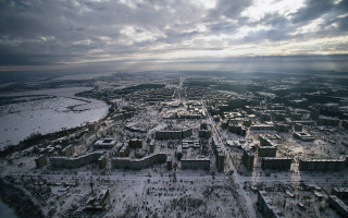 Snowy city river cloudy sky 3 - a city free wallpaper