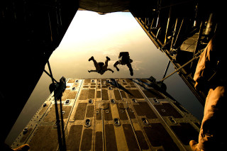 Couple jumping boat water sunset - felixkelly free wallpaper