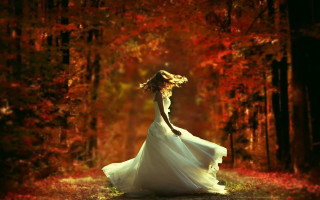 Woman white dress forest autumn 2 - flowing free wallpaper