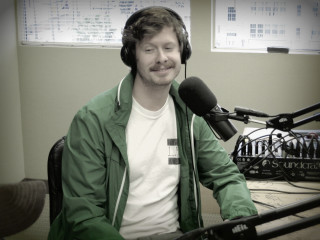 Man headphones microphone green jacket - a green jacket free wallpaper