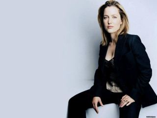 Woman black suit white chair - a black suit free wallpaper