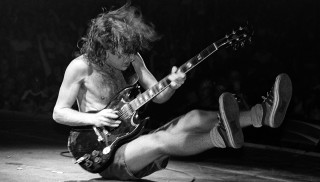 Man guitar stage crowd debris - cliff childs free wallpaper