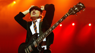 Man suit tie guitar stage - a guitar free wallpaper