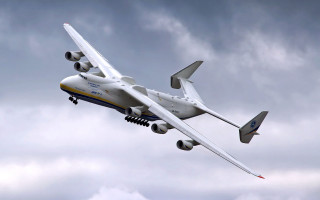 Jetliner flying cloudy sky landing - epic proportion free wallpaper