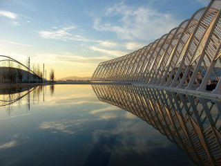 Large building water sky clouds 3 - a few building free wallpaper
