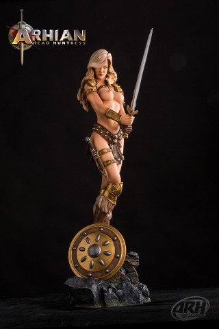 Statue woman sword armor rock - a rock free wallpaper