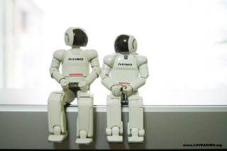 Two robots ledge window building - a ledge free wallpaper