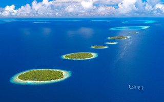Small islands ocean plane flying - ecological art free wallpaper