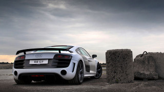 White sports car desert rock - rim free wallpaper