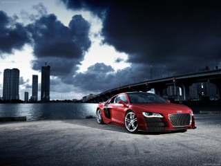 Red car parked bridge cloudy - a red car free wallpaper