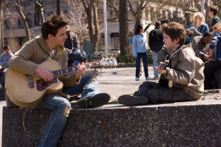 Man playing guitar boy sitting - a boy free wallpaper