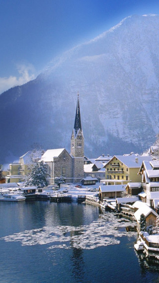 Snowy town church hill water - a detailed matte painting free wallpaper