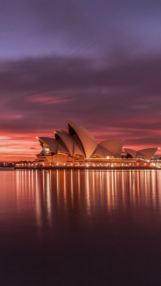 Large building water ocean night - australian tonalism free wallpaper