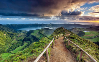 Path mountain top valley cloudy - a view of a valley and mountains free wallpaper