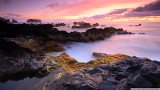 Rocky beach sunset water clouds - bascove free wallpaper