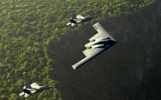 Two planes flying over forest - tree and mountains free wallpaper