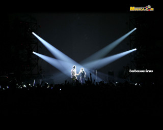 Couple people stage spotlights concert - their pocket free wallpaper
