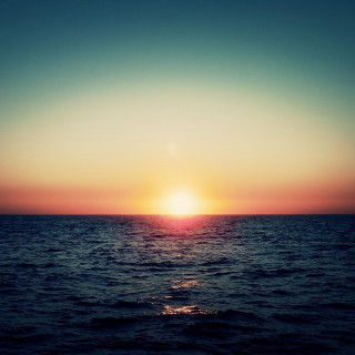 Sunset ocean boat person shore 2 - a boat free wallpaper