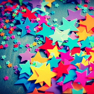 Colorful stars pile tabletop black - florianne becker free wallpaper