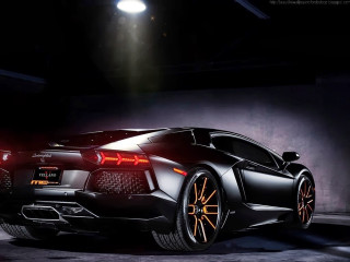 Black sports car dark garage 7 - a spotlight free wallpaper