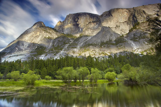 Mountain lake trees foreground cloudy 2 - a mountain range free wallpaper
