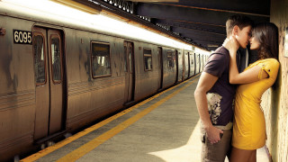 Man woman kissing train station 2 - a station free wallpaper