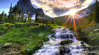 Waterfall mountain sunbeam sky nature 4 - a green field below free wallpaper