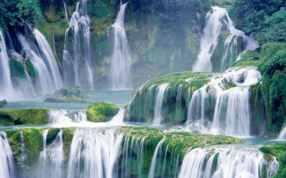 Waterfall green vegetation forest mountain - a waterfall free wallpaper for desktop