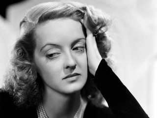 Woman necklace blackjacket holding head - eileen aldridge free wallpaper