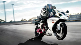 Motorcycle rider track sky clouds 2 - a person riding free wallpaper