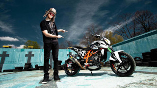 Man pointing motorcycle lot fence - a man free wallpaper