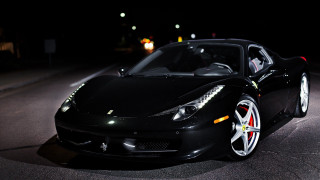Black sports car night hood - the side of the road free wallpaper