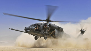 Helicopter flying low desert dust - gear free wallpaper