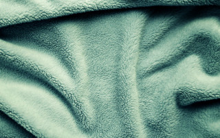 Blanket closeup green black white - a black border free wallpaper