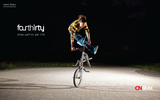 Man riding bike air night - chris labrooy free wallpaper