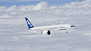 Large jetliner flying cloudy sky 2 - a cloudy sky above the clouds free wallpaper