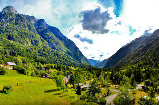 Valley mountain village cloudy sky - a scenic view of a valley free wallpaper