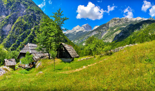Grassy field mountain hut foreground - alen divi free wallpaper