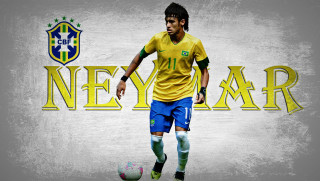 Soccer player yellow shirt kicking - a soccer ball free wallpaper